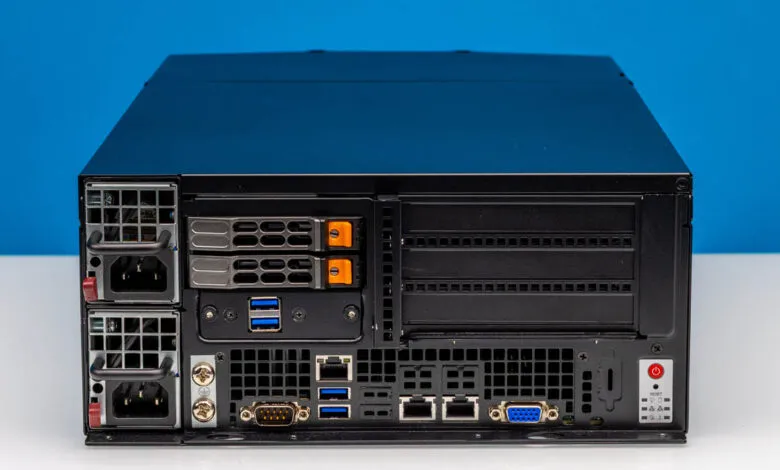 Rear view of Supermicro SYS-E403-14B-FRN2T server with ports and power supplies.