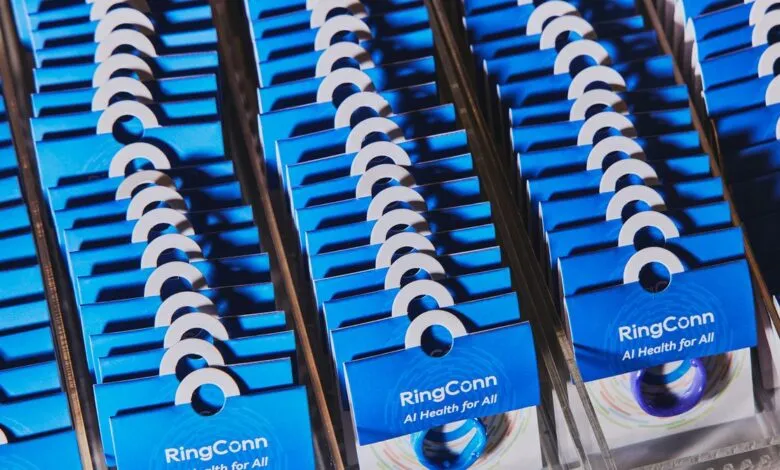 Rows of RingConn AI health rings in blue packaging.