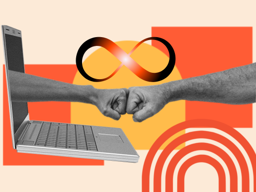 Two fists bump, one emerging from a laptop screen, symbolizing connection.