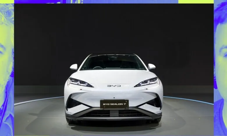 Front view of white BYD Sealion 7 electric car on display.