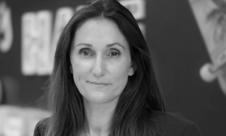 Black and white portrait of a woman with long hair.