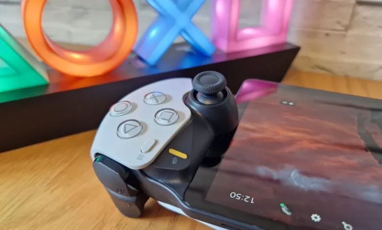 PlayStation Portal handheld console with controller and illuminated PS symbols.