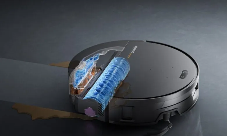 Eureka Z50 robot vacuum cleaner cleaning a dirty floor with fresh water.