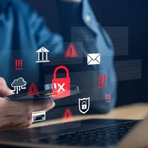 Person holding phone with security icons overlayed, representing cyber threats and data protection.