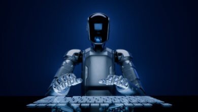 Robot typing on a glowing keyboard against a dark blue background.