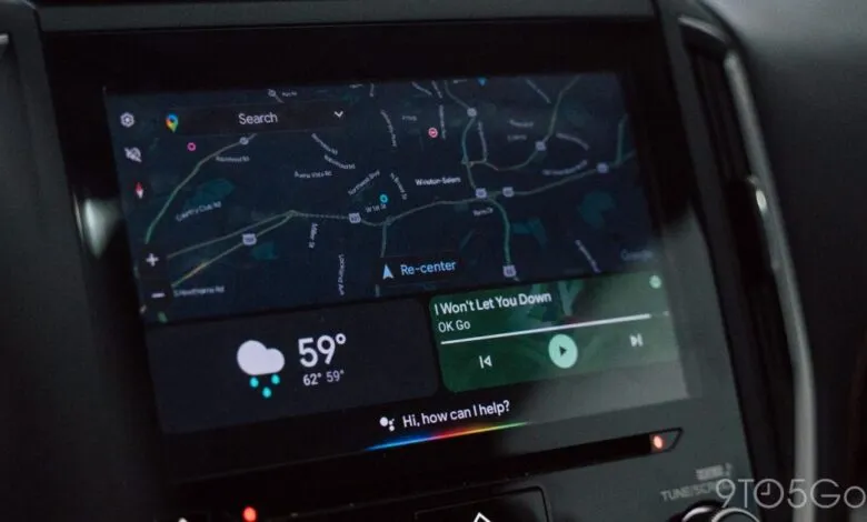Car dashboard screen displaying Google Assistant, maps, weather, and music.