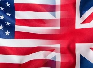 Overlapping American and British flags, symbolizing US-UK relations.