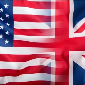 Overlapping American and British flags, symbolizing US-UK relations.