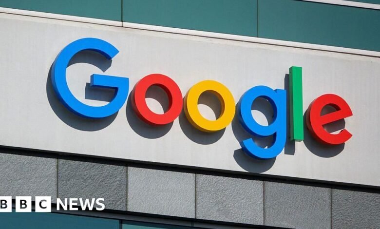 Google logo on building exterior, colorful and iconic.