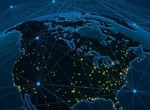 Globe showing North America with interconnected network lines and city lights.