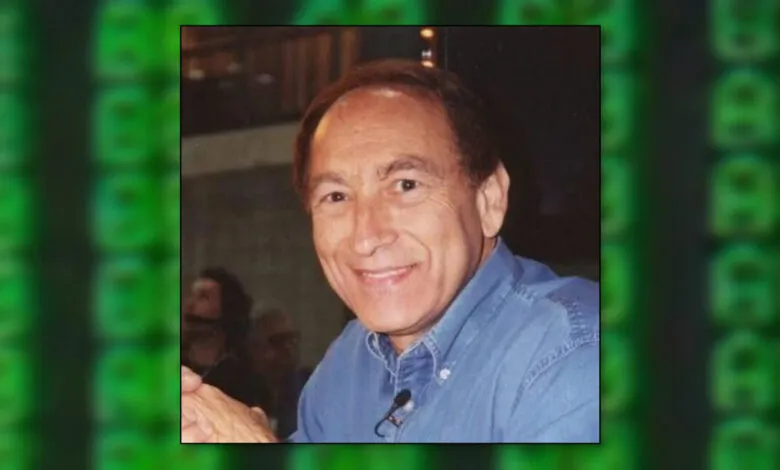 Portrait of Hal Finney smiling in a blue shirt.