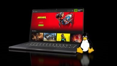 Laptop displaying GeForce Now with Tux the Linux penguin mascot beside it.