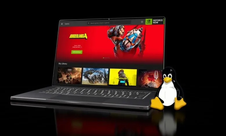 Laptop displaying GeForce Now with Tux the Linux penguin mascot beside it.
