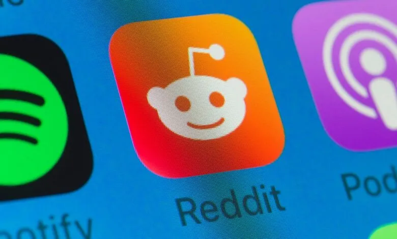 Close-up of Reddit app icon on a smartphone screen.
