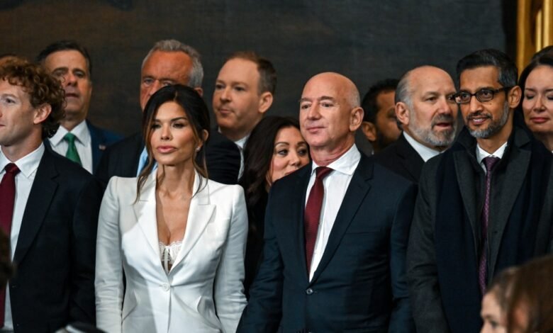 Group of business leaders including Bezos, Zuckerberg, and Pichai.