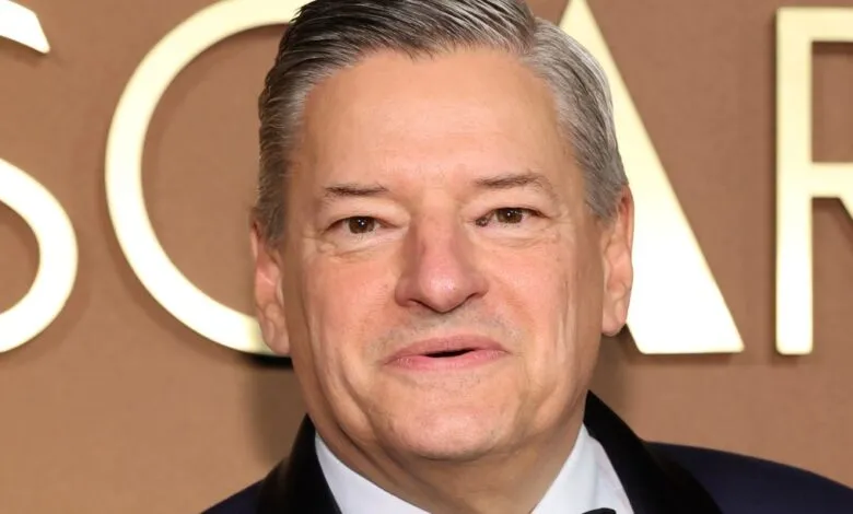 Close-up of Ted Sarandos at an event, smiling slightly.