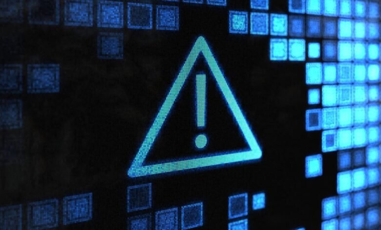 Blue warning sign with exclamation point on digital display.