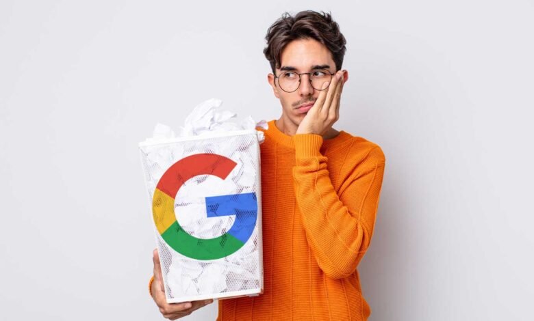 Man with Google logo trash can looking thoughtful.