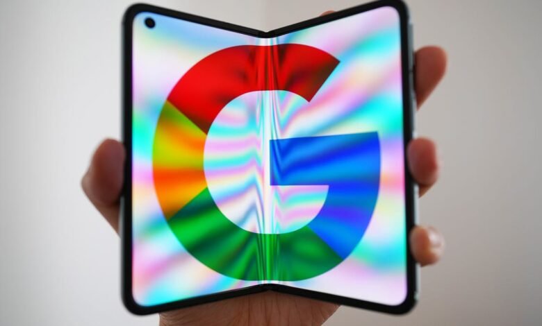 Foldable phone displaying the Google logo on a vibrant, colorful screen.