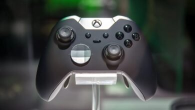 Close-up of a black Xbox Elite Series 2 controller on a stand.