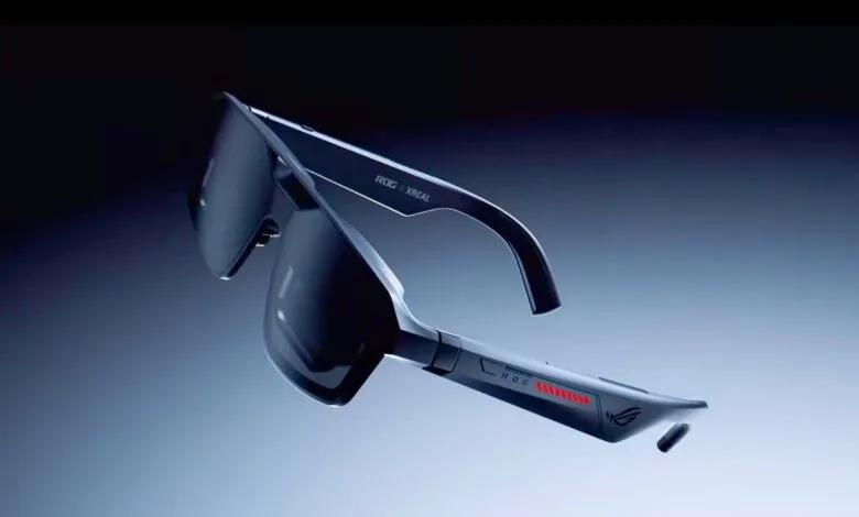 ROG XREAL Air AR glasses floating against a gradient background.