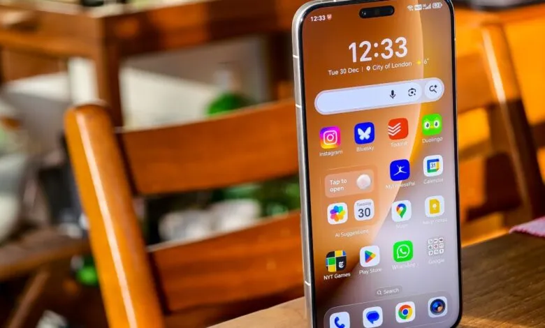 Smartphone displaying home screen with various app icons and time 12:33.