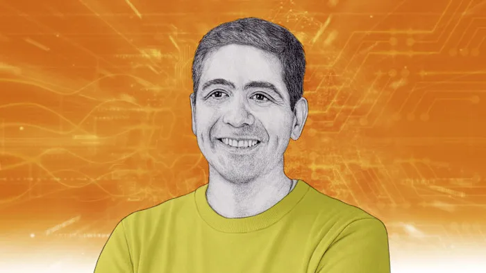 Illustration of a smiling man in a yellow shirt against an orange tech background.