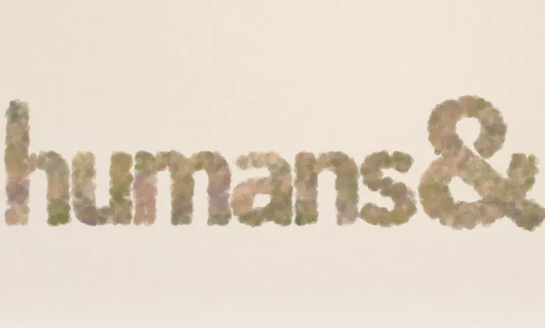 The word 'humans&' formed from blurry, soft-edged circles.