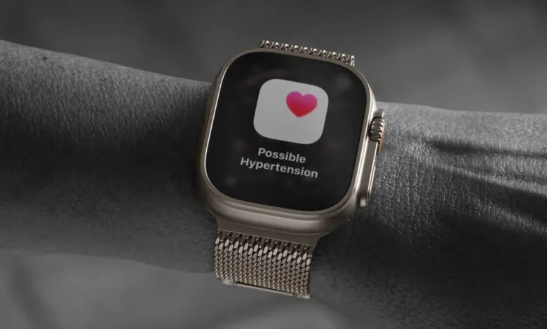 Apple Watch Ultra displays 'Possible Hypertension' notification on wrist.