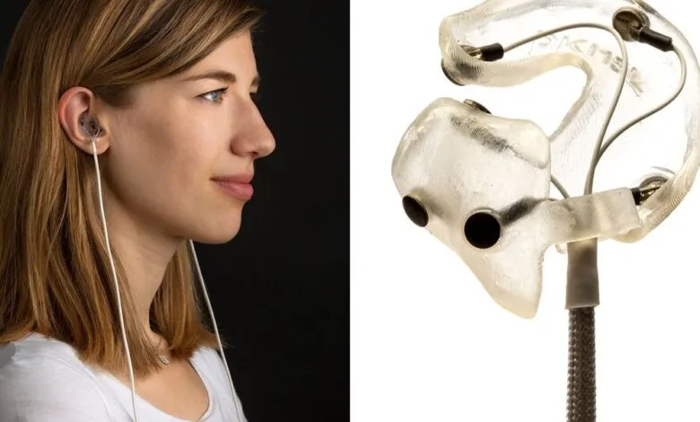 Multiple black LiDAR sensors arranged in rows on a white surface.