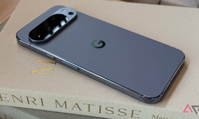 Back view of a Google Pixel phone in blue resting on a book.