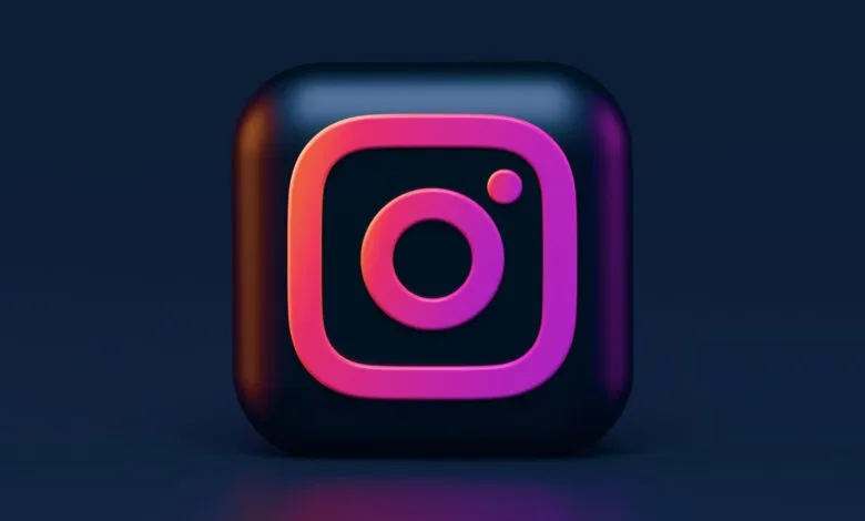 Instagram logo with pink and orange gradient on a dark background.