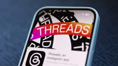 Smartphone displaying the Threads app icon and name.