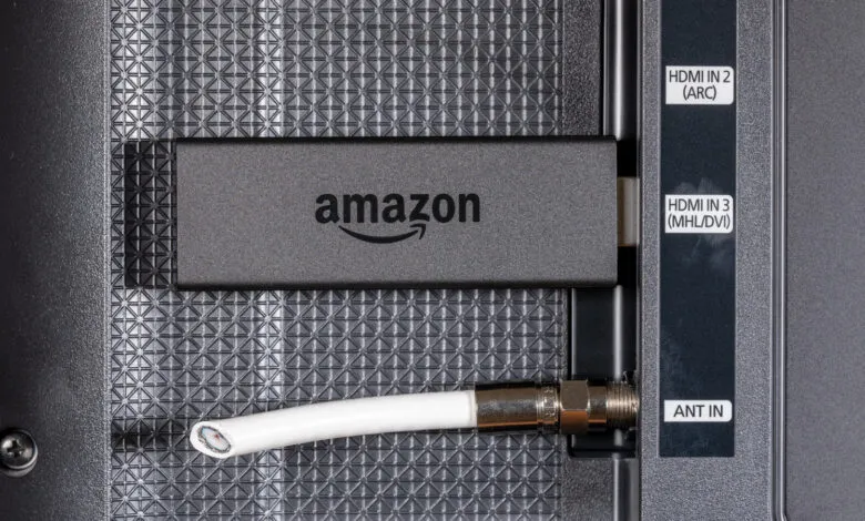 Amazon Fire Stick plugged into HDMI port on back of television.