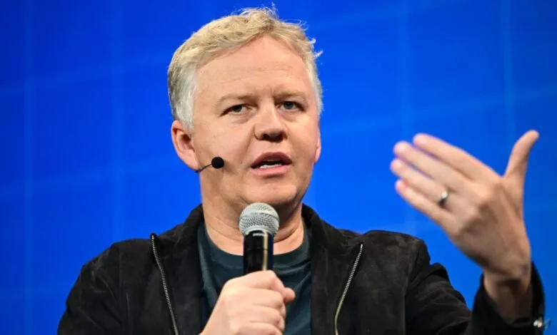 Matthew Prince speaks at a tech conference, gesturing with his hand.