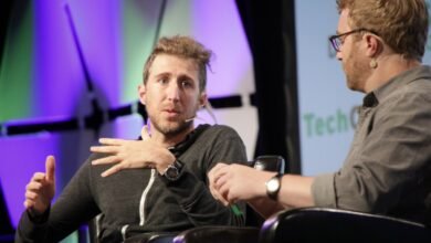 Moxie Marlinspike speaking at a tech conference.