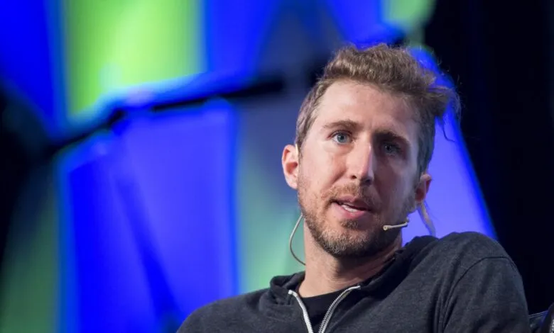Moxie Marlinspike speaking at a tech conference.