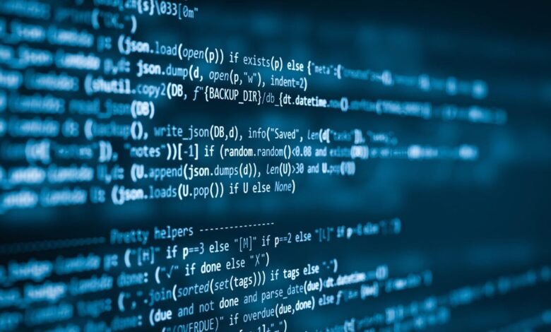 Lines of blue code displayed on a dark computer screen.