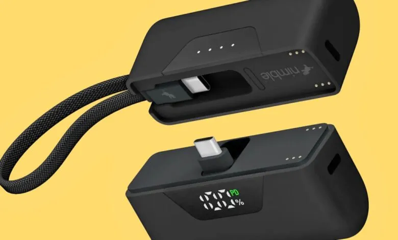 Two black Nimble power banks floating against a yellow background.