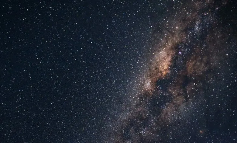 Night sky filled with countless stars and the Milky Way galaxy.