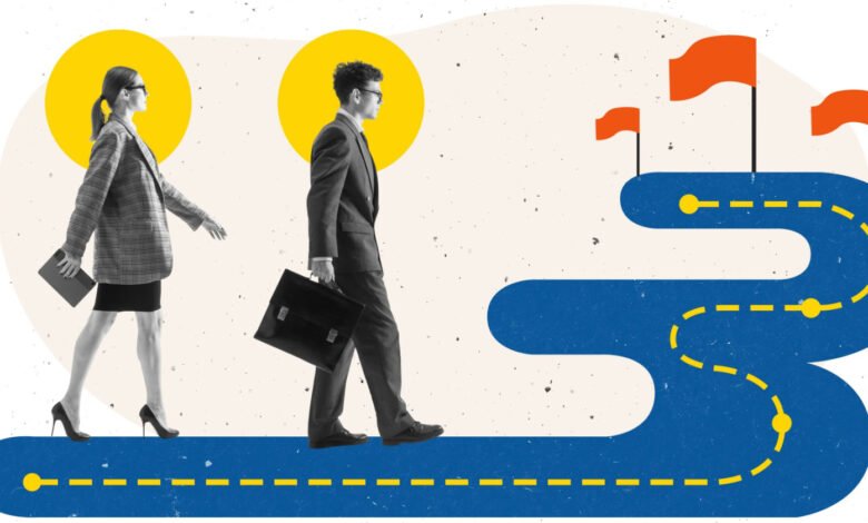 Business professionals walking on a path towards goals represented by flags.