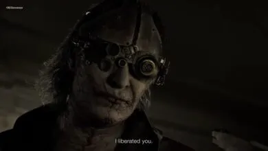 Creepy character with goggles and scars says 'I liberated you'.