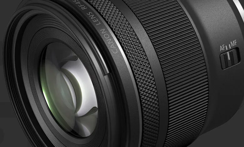 Close-up of Canon RF 45mm lens showing focus switch.