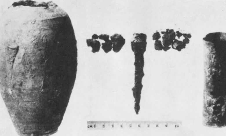 Components of the Baghdad Battery: jar, metal rod, cylinder, and residue.
