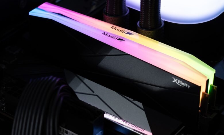 Close-up of colorful Manta Xfinity RAM sticks in a computer.