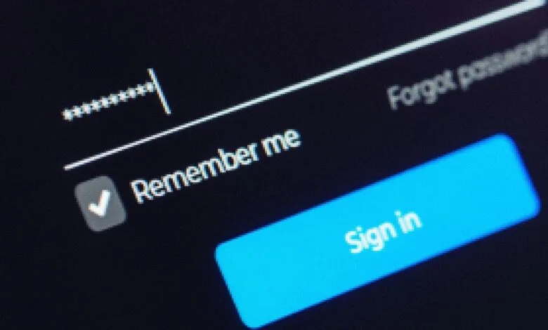 Close-up of login screen with password field and 'Remember me' checked.