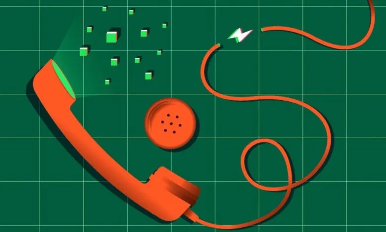 Orange phone receiver with cord and speaker on green grid background.