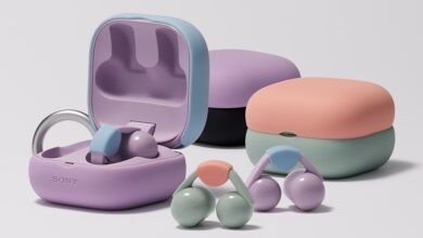 Pastel-colored Sony LinkBuds with open charging case and two closed cases.