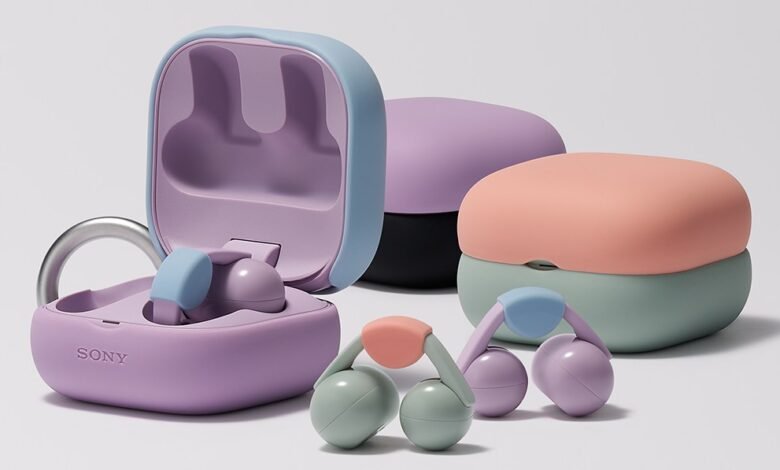 Pastel-colored Sony LinkBuds with open charging case and two closed cases.