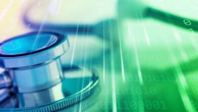 Close-up of a stethoscope with binary code overlay, medical technology concept.